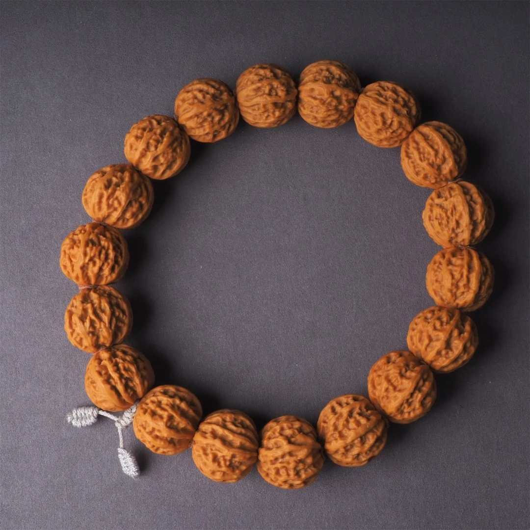 平谷粗筋密纹麒麟纹！钢铁一样的骨质小核桃手串文玩好物