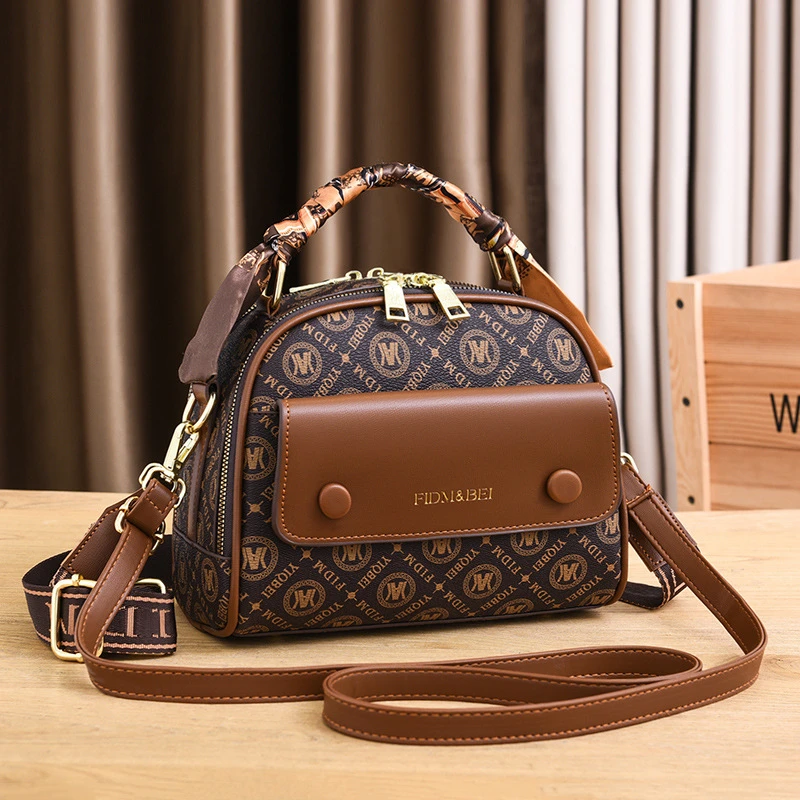 2025新款时尚潮流ins笑脸包单肩斜挎手提小众包包女士小包大容量