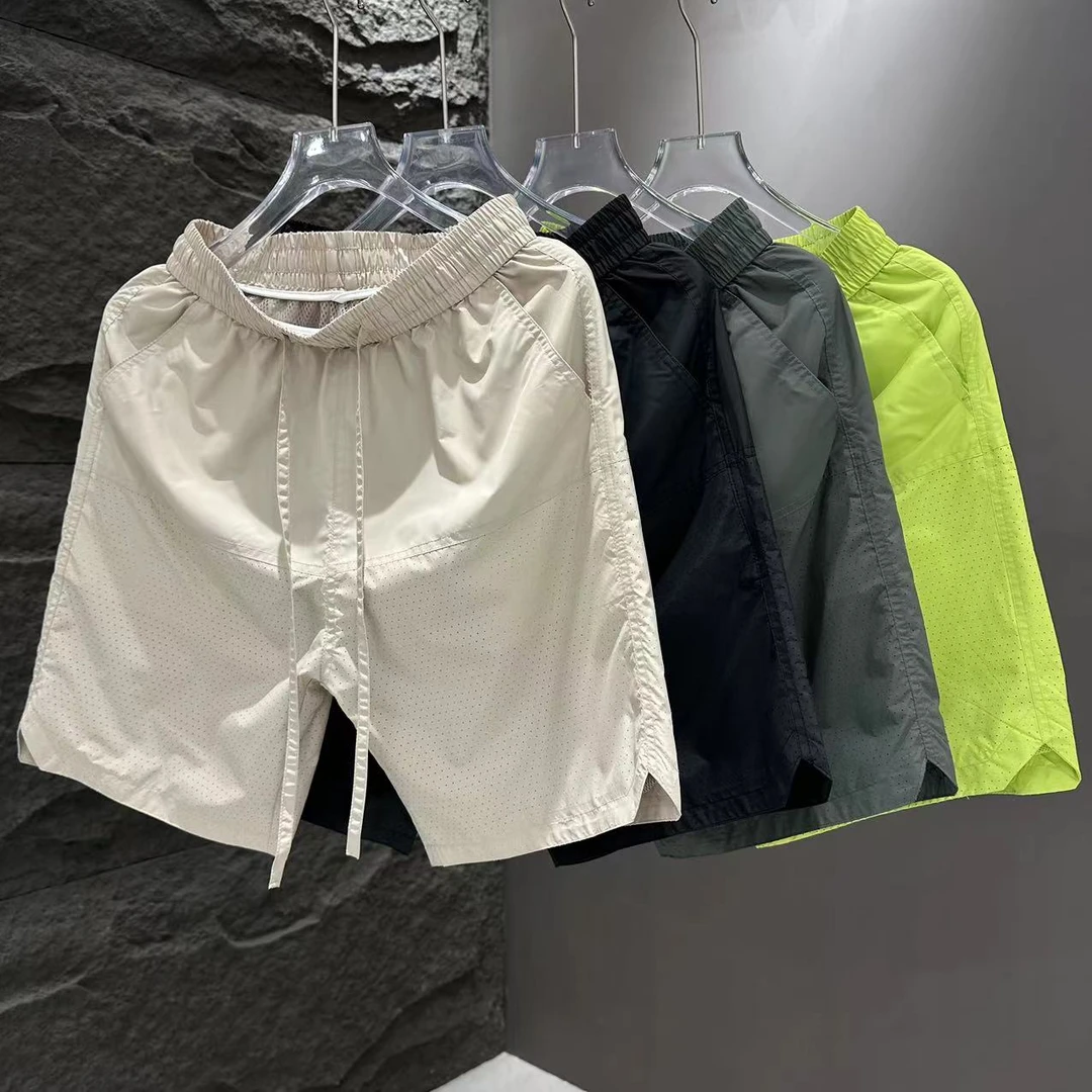 夏季新款透气休闲潮流薄款打孔时尚速干短裤652