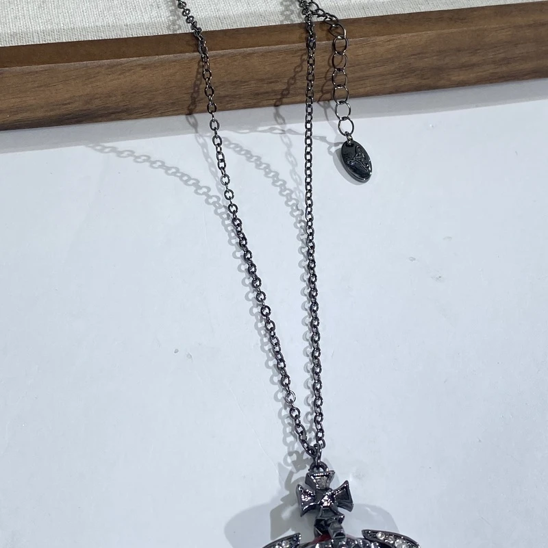 铜合金项链 04298大淇原创简约风黑色星球元素十字花镶锆个性项链