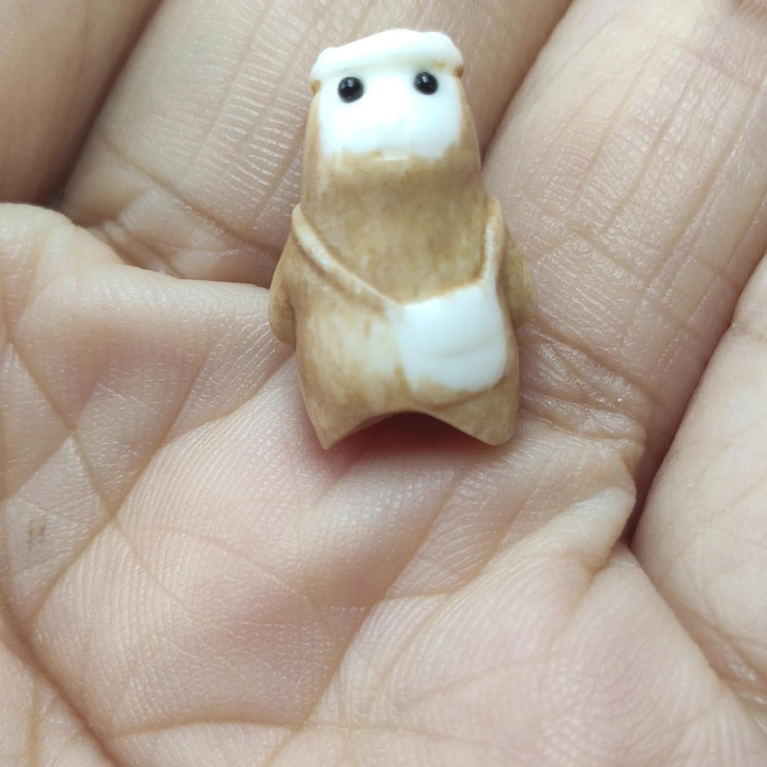 口袋熊可爱配饰，可做备云或小挂件，骨头材质，多样性发货发一个