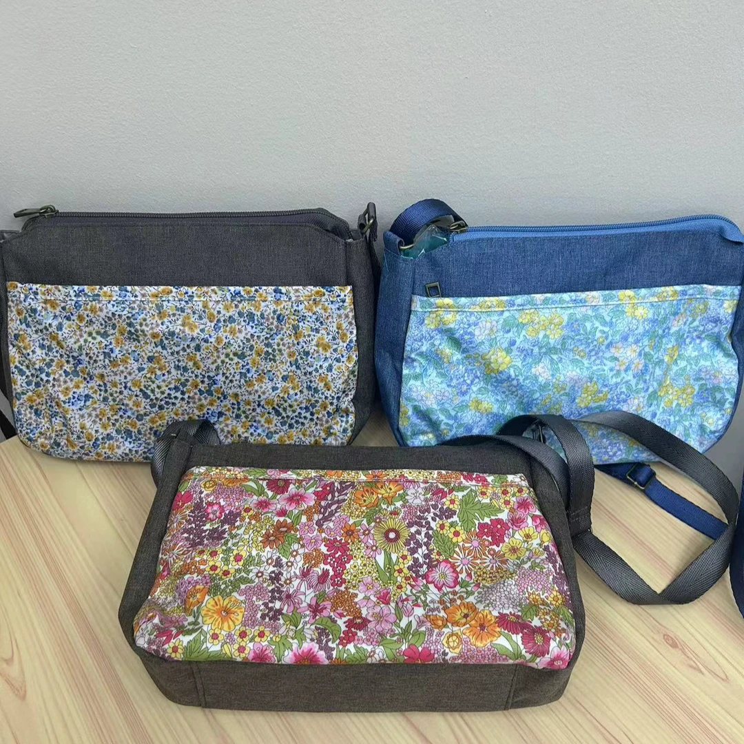 【十万粉丝】18x25x8cm 高货利伯缇撞色拼接时尚拉链大号斜挎包