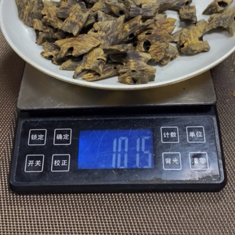 沉香木手把件琼块料101克