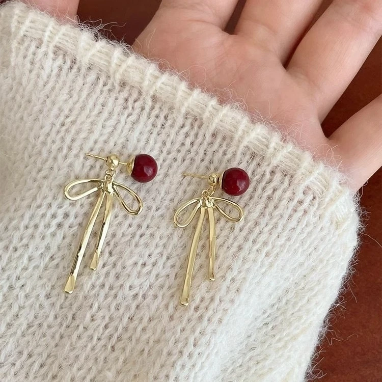 铜合金耳饰  安可拉红蝴蝶结珠珠耳钉女小众温柔时尚精致百搭耳环