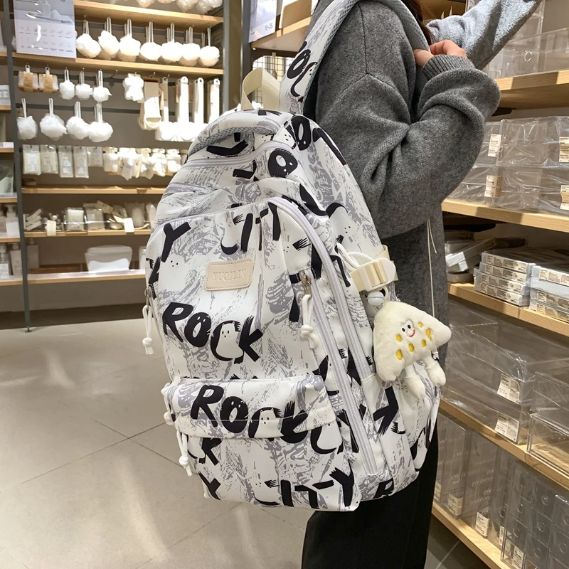 新款书包女生大学生高中学生大容量背包初中生小学生双肩包高颜值