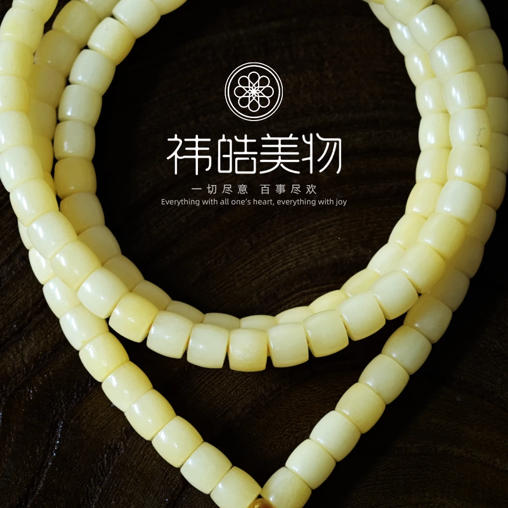 精品驼骨108手串6x5直切黄透料