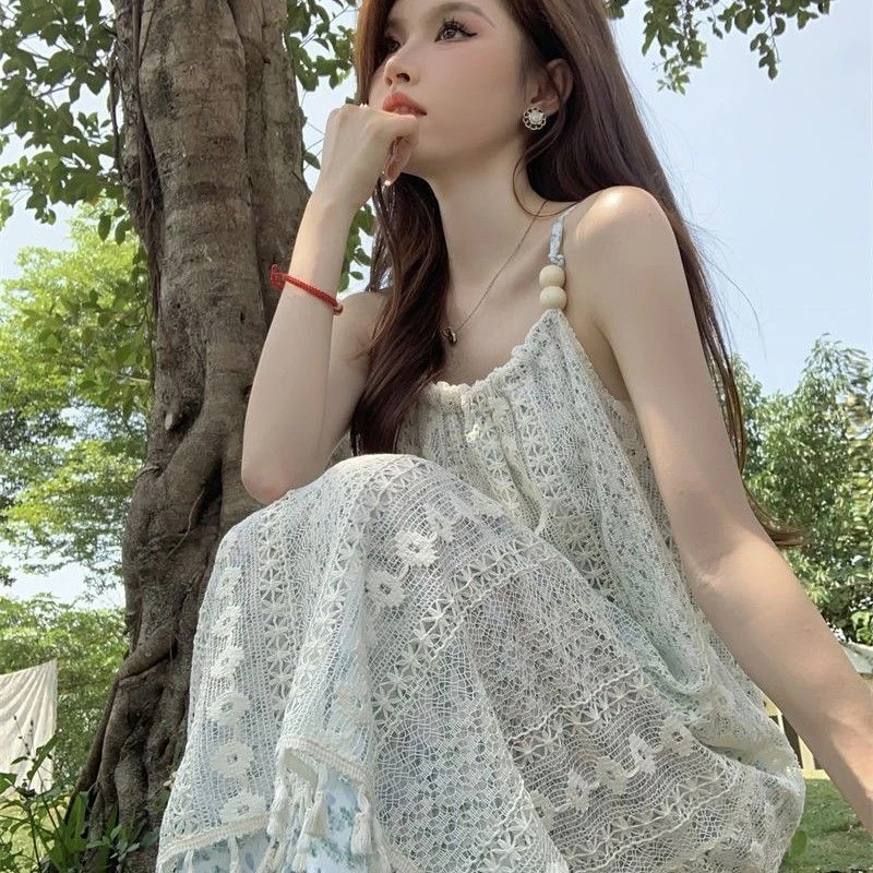 度假风流苏海边吊带连衣裙女夏季新款波西米亚碎花裙超仙法式裙子
