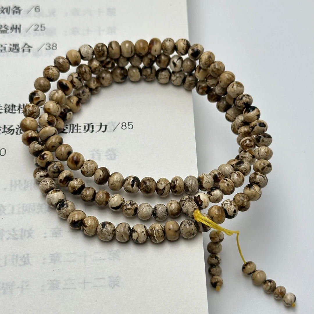 RR83抚顺琥珀（精品满干白花）珠串 4.8mm