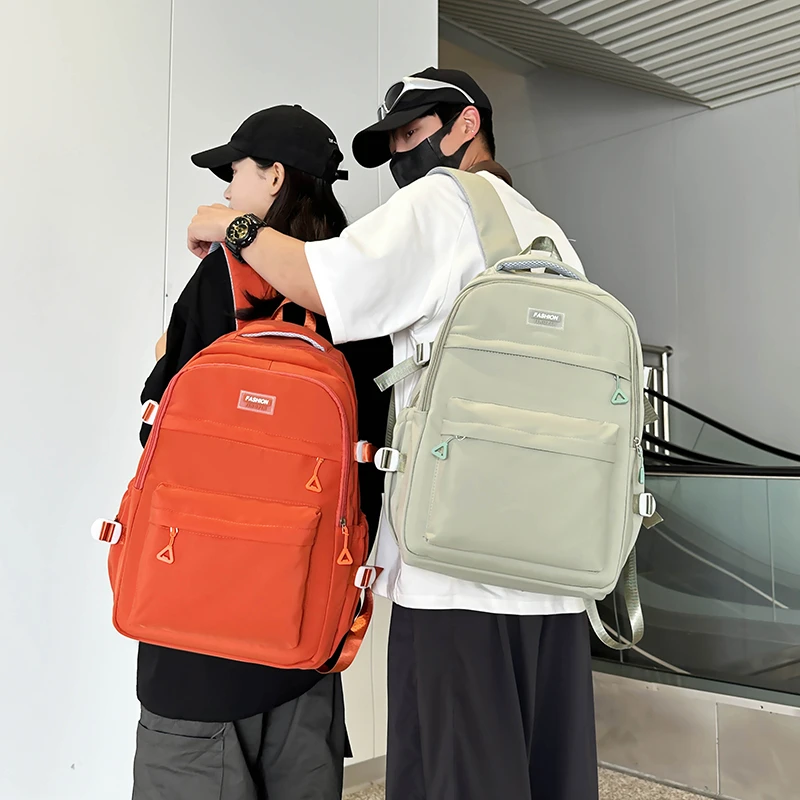 背包男士休闲出差旅行双肩包男女初中高中大学生书包男生简约潮流