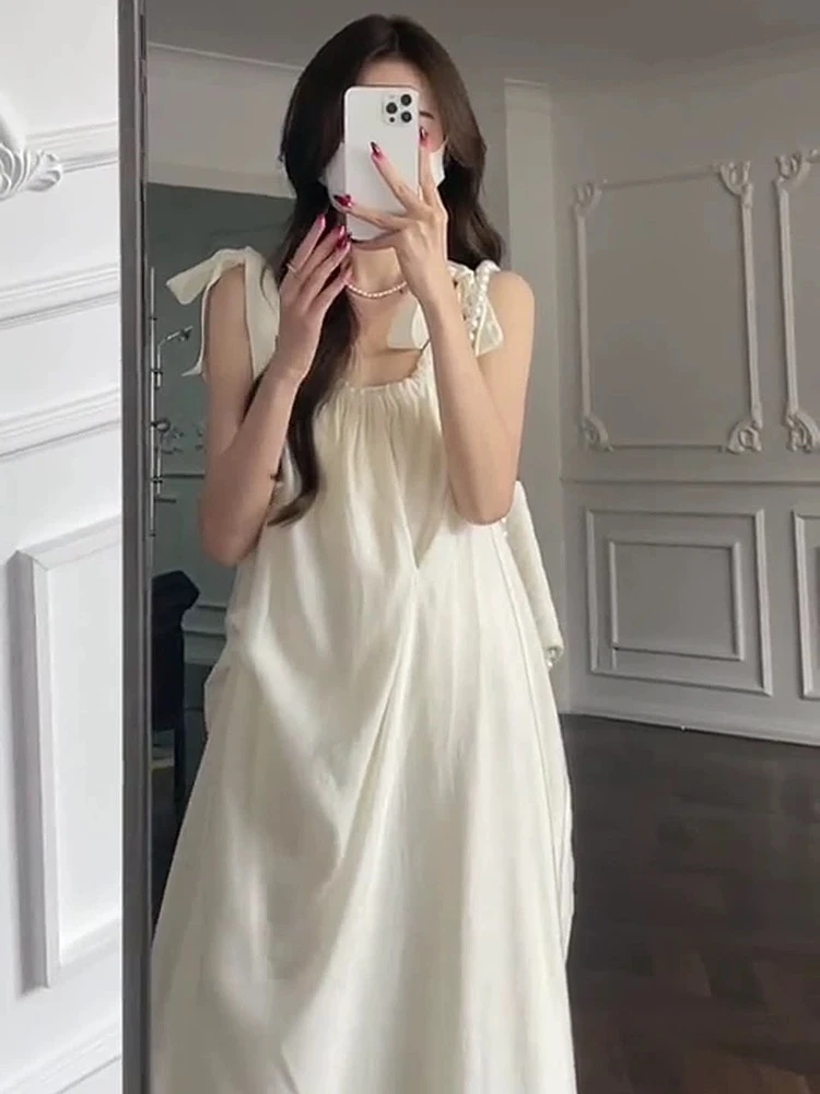 宽松连衣裙绝美纱裙子显瘦沙滩吊带裙性感夏季法式甜美小众无袖
