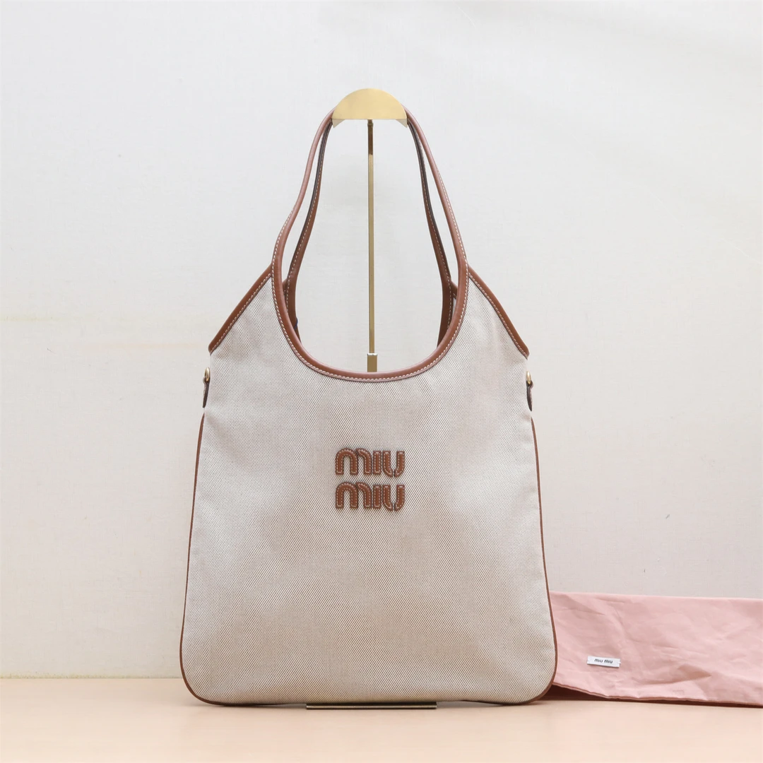99新 MIU MIU/缪缪 【小花念念】IVY Tote托特包35米色皮革C/帆布