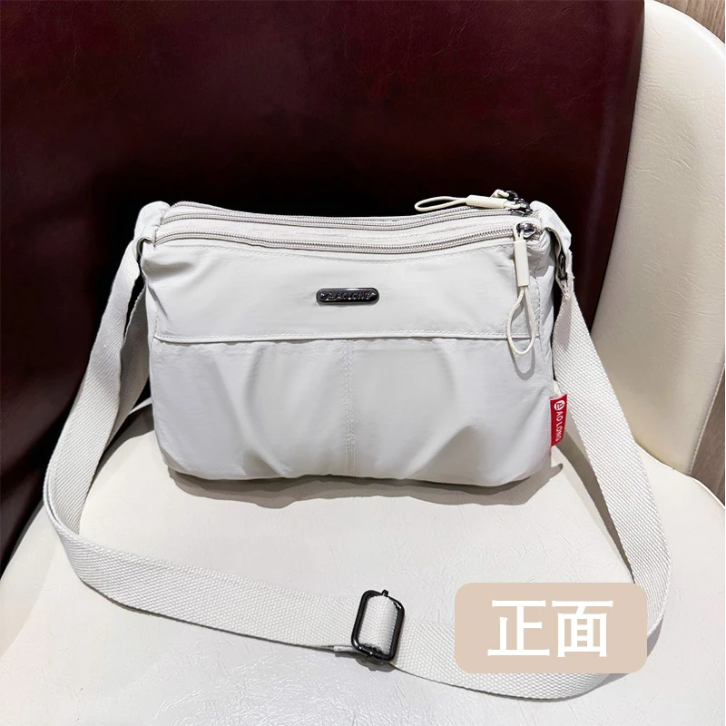 斜挎包女2025新款时尚单肩百搭轻便防水包通勤小众百搭精致小包包