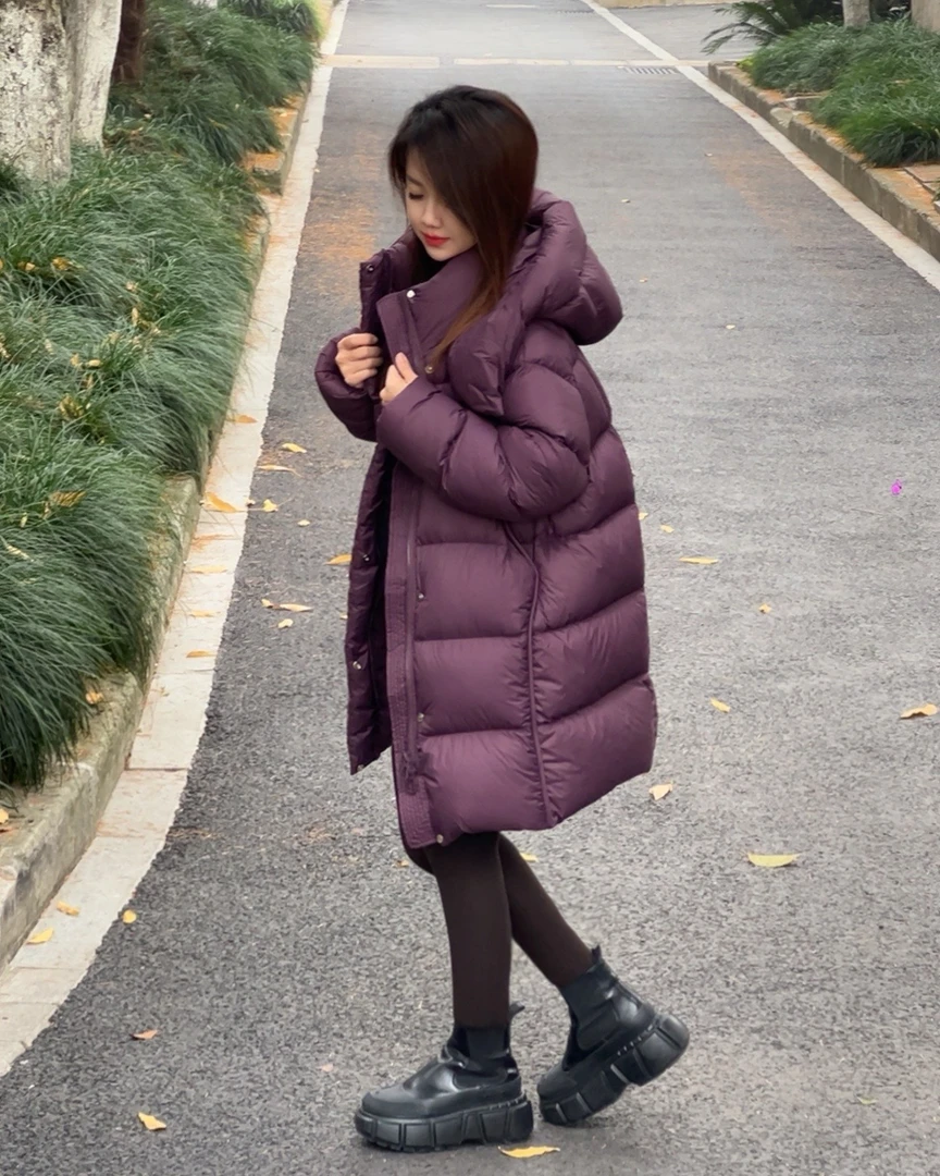 高版本加厚保暖泡芙95白鹅绒女时尚百搭连帽中长款羽绒服16F609