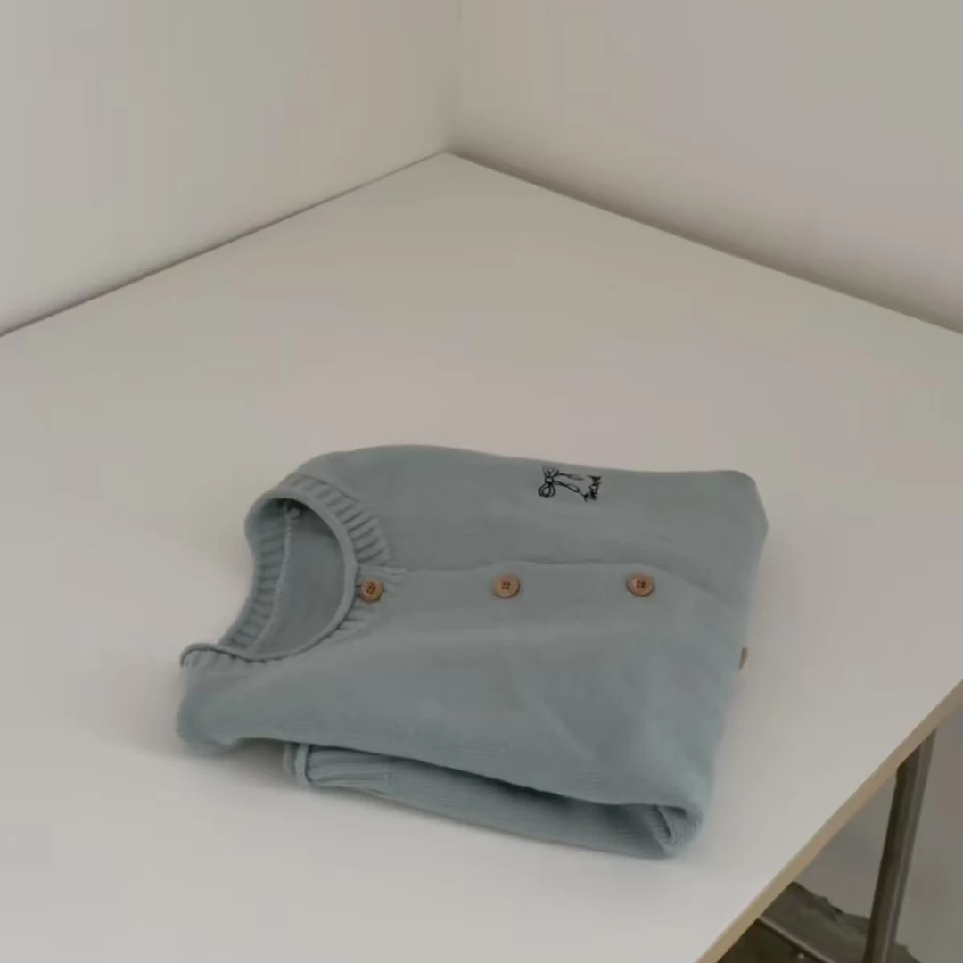 清蝴蝶结开衫毛衣     no.退no.换