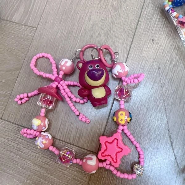 G193（满9.9包邮）小粉熊手机链边夹