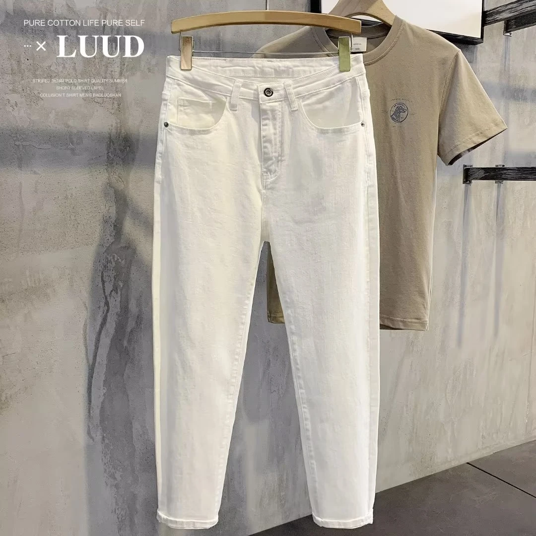 秋季弹力休闲白色9九分牛仔裤男青年潮流百搭毛边小脚裤纯色裤子