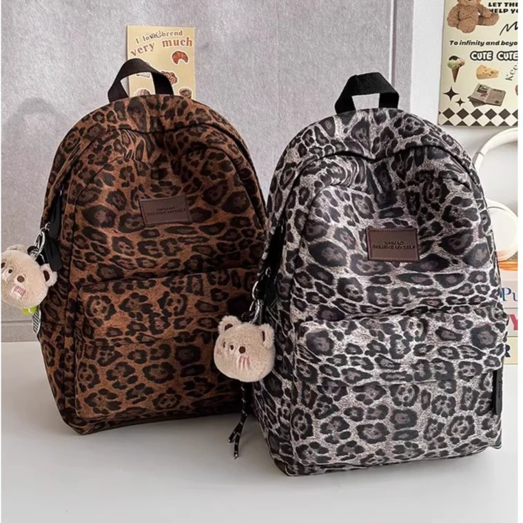 美式复古潮流豹纹书包2025秋冬双肩包女学生轻便休闲通勤旅游背包