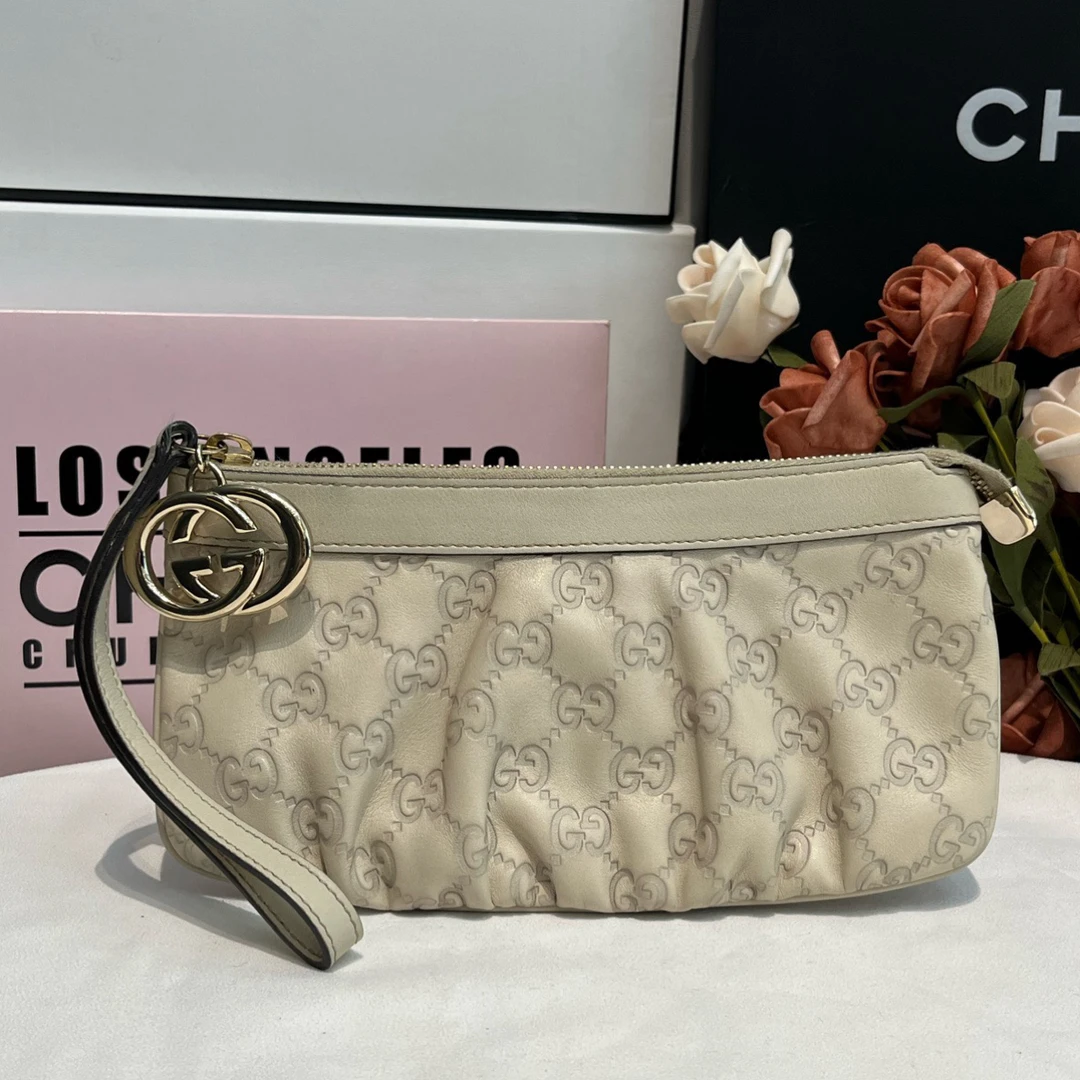 95新 GUCCI/古驰 白色压纹手拿包时尚百搭