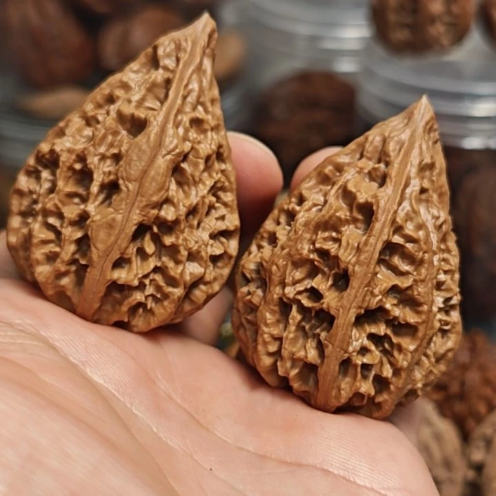 桃核把件桓仁塔尖异形