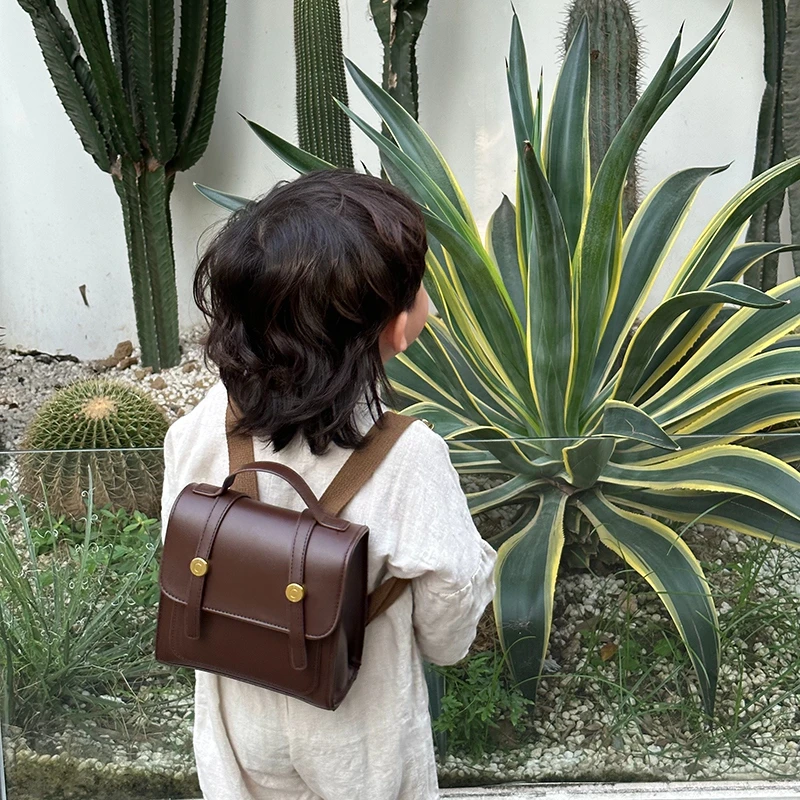 韩版儿童小背包复古男童幼儿园书包迷你pu女童宝宝外出百搭双肩包