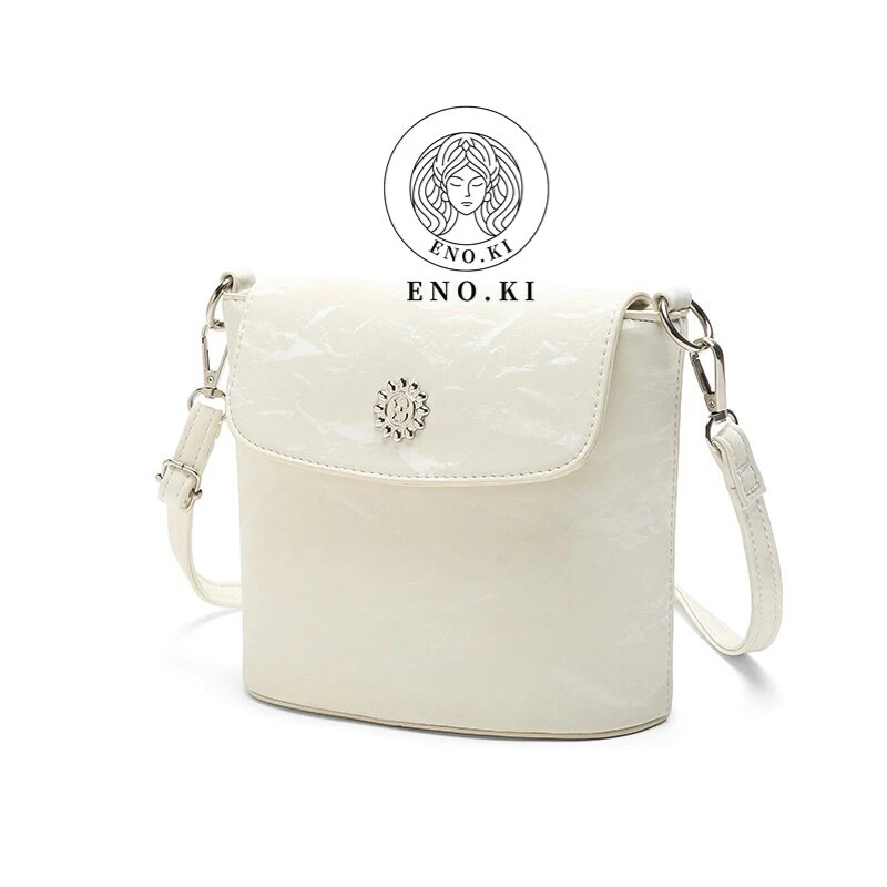 ENO.KI 依诺琪时尚斜跨太阳花百搭时尚白色水桶包-8