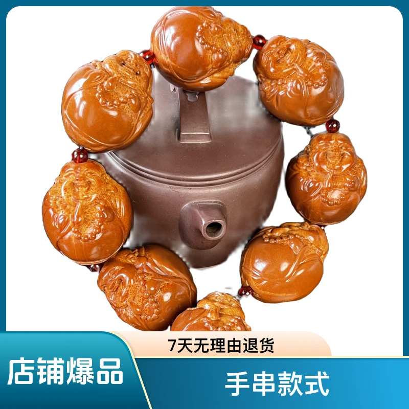天然巴西橄榄核雕刻  弥勒手持 尺寸3.3左右
