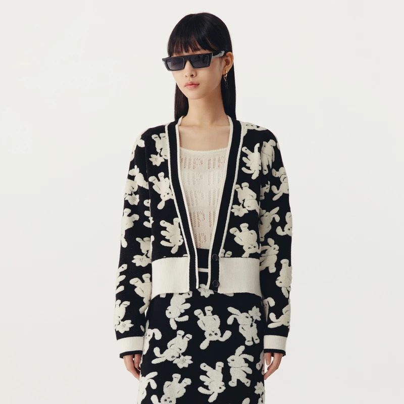 HPLY/荷比俪春季新款女复古黑白提花深V襟针织衫HYD11650223