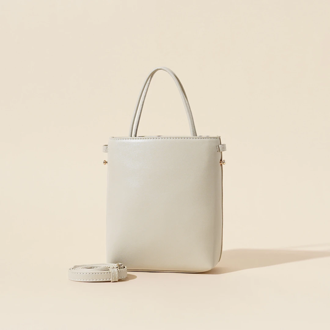 岩牛真皮手机包女斜跨通勤小包新款竖款软皮包包休闲百搭单肩包