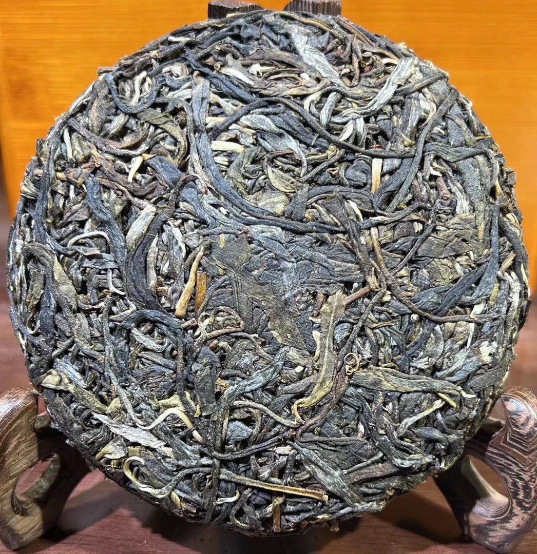 【忙麓山】2009年忙麓山古树头春100克饼(兰花香浓郁)