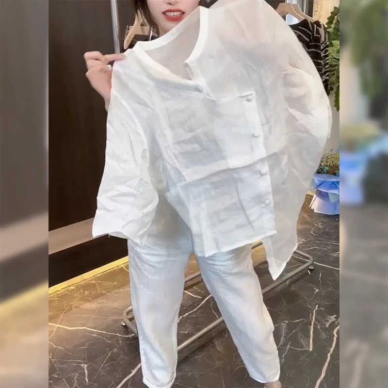 新款时尚显瘦防晒衬衫女薄款V领温柔风七分袖透气宽松上衣