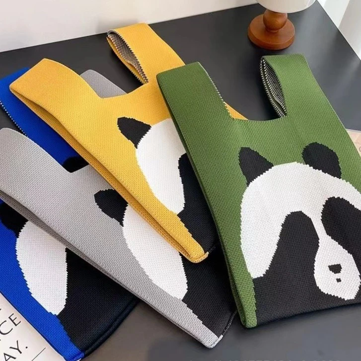 可爱熊猫手提包女针织毛线水桶包日韩版小包包手拎休闲网红盒饭袋