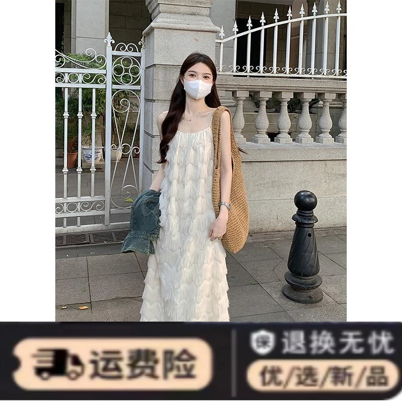 度假风吊带连衣裙女春季韩版2024新款流苏设计感显瘦气质过膝长裙