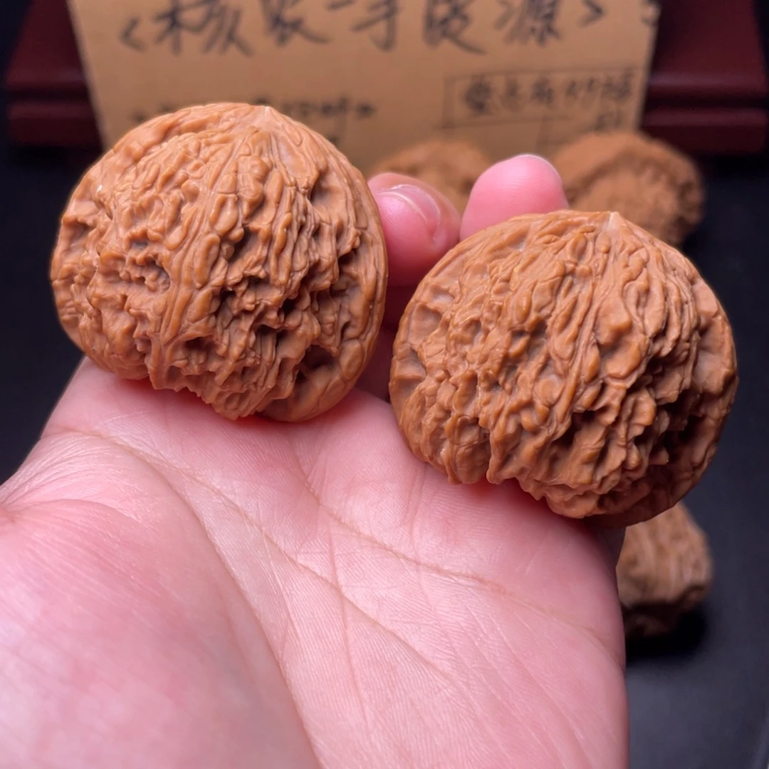 文玩核桃把件42+精品红皮南疆石