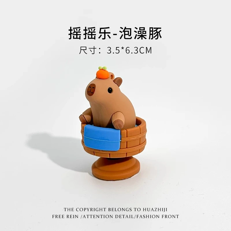 2024新款卡皮巴拉水豚鼠摇摇乐车载摆件办公桌面摆件电动车装饰品