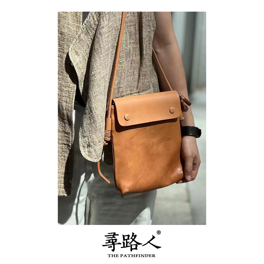 寻路人个性百搭时尚纯色斜跨风格款绑绳扭扭包