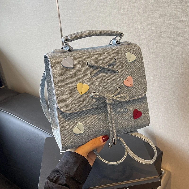 艾米兔女包2024新款韩系蝴蝶结爱心设计手提洋气时尚大容量双肩包