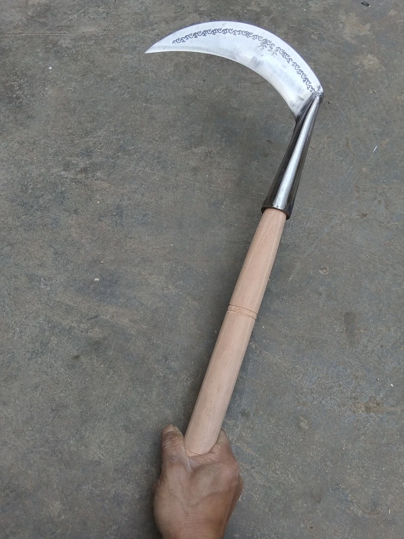 云南手工锻打夹钢花纹镰刀（砍割两用）