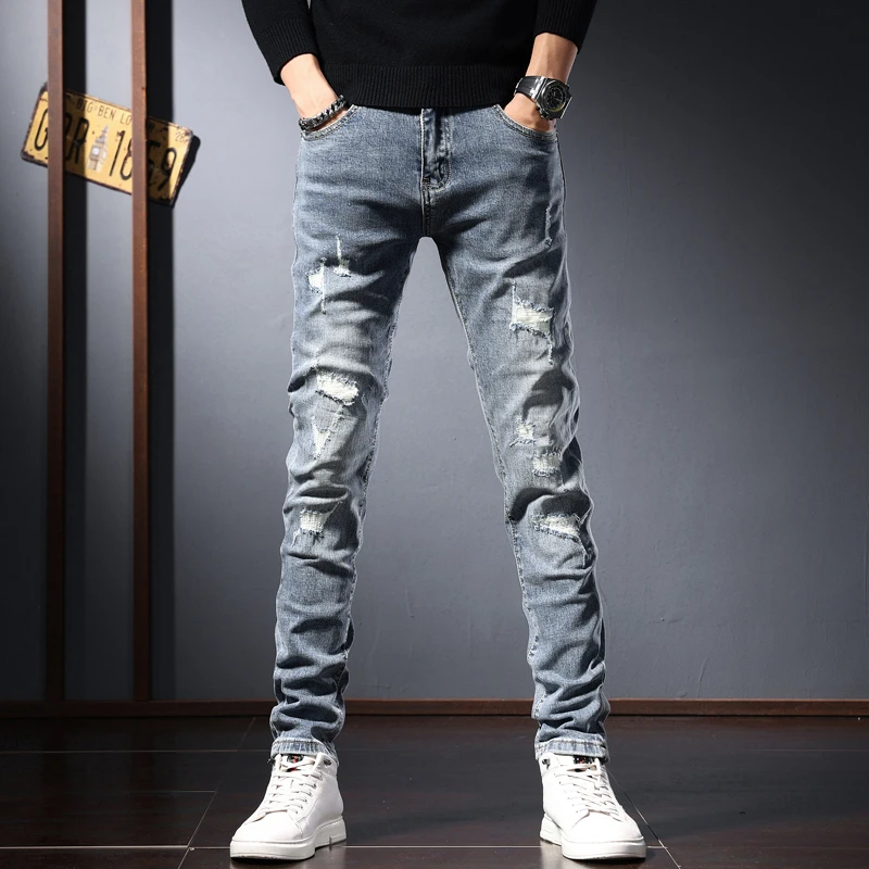 秋季新款蓝色牛仔裤男装修身弹力破洞补丁休闲长裤韩版耐磨小脚裤