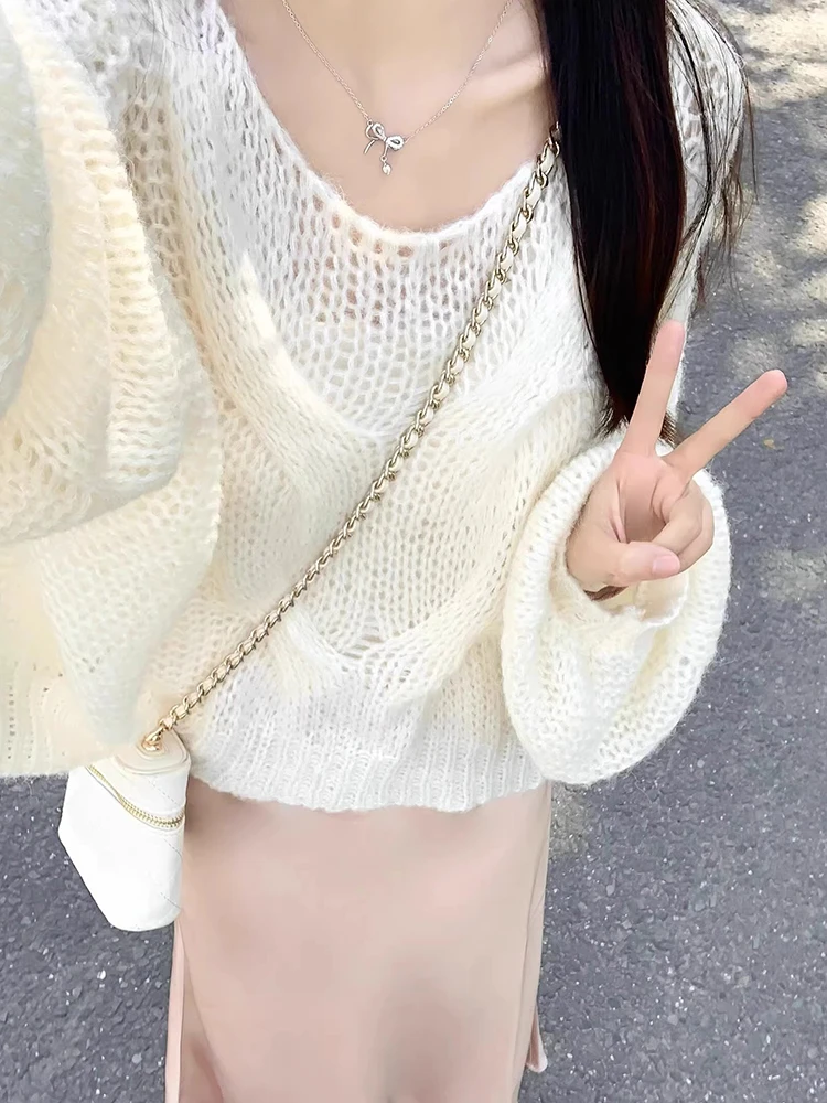 白色温柔镂空针织衫女早春韩系穿搭套头毛衣慵懒宽松长袖chic上衣