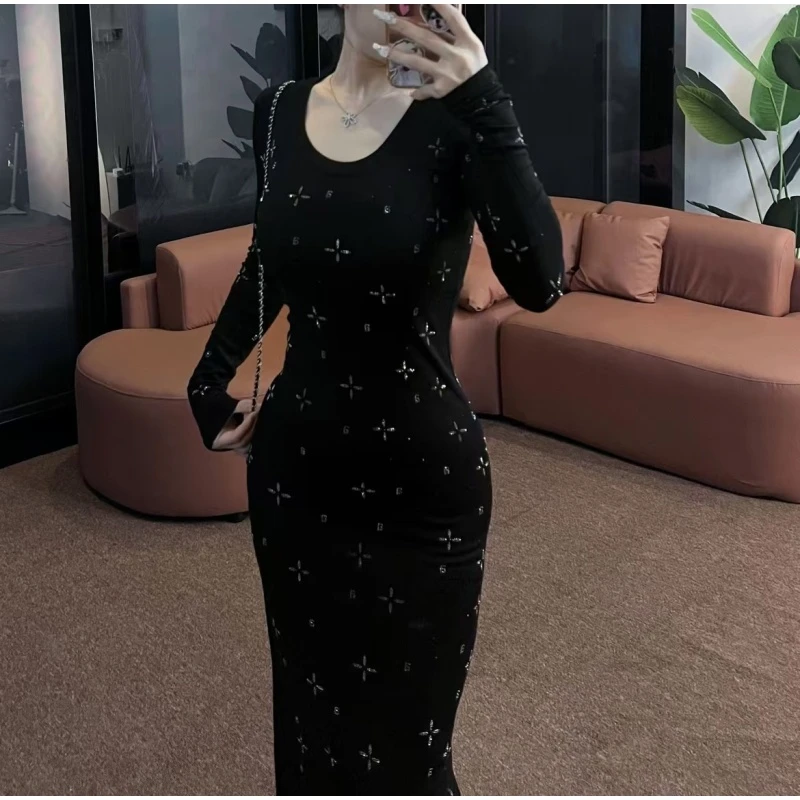 XJ09早秋气质修身钻钻收腰长袖时尚秋季开叉满钻黑色连衣裙女装包