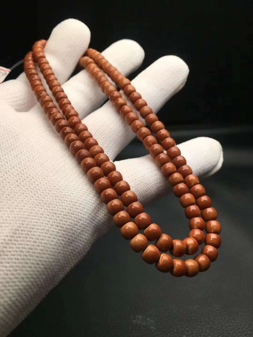 橄榄核雕108脖挂核尖0.61文玩核尖108挂脖手工极限弧脖挂核尖