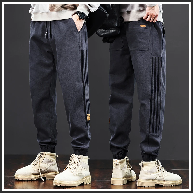 春秋新款男士休闲裤条纹宽松束脚仿牛仔长裤潮流百搭时尚哈伦裤子