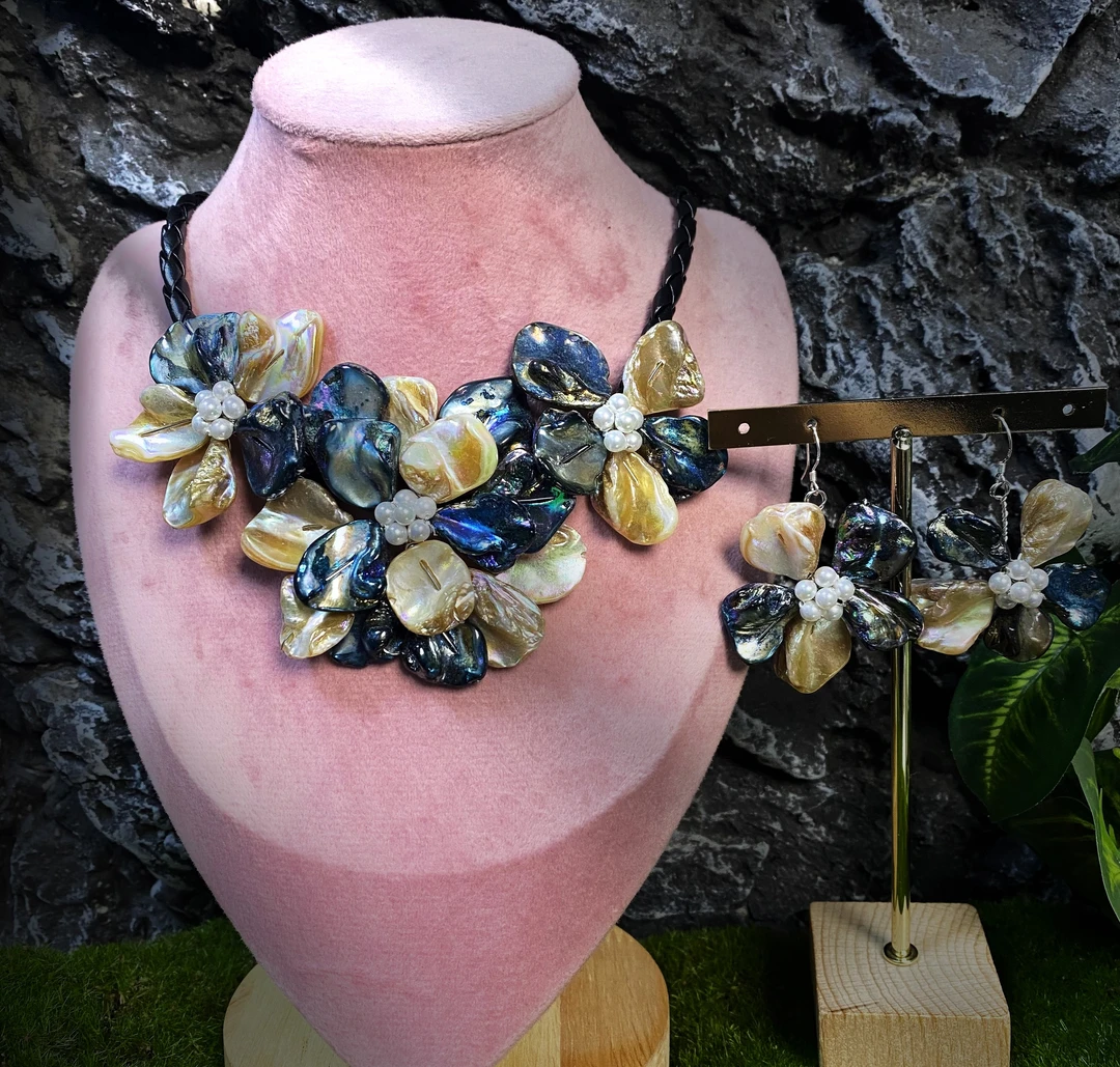 钛钢贝壳项链 11527手工意大利手工编织深海乳蓝白花瓣项链