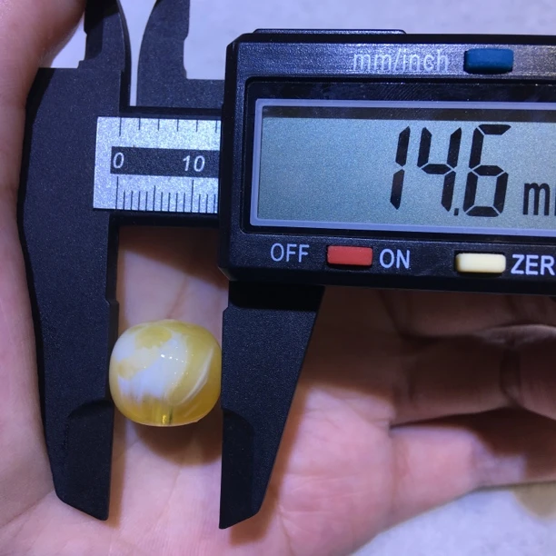 蜜蜡金瓷白老型珠 规格：14.6*13.6mm