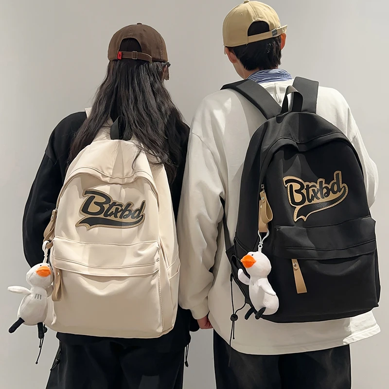 书包男生初中生高中大学生简约背包小学生大容量旅行电脑双肩包女