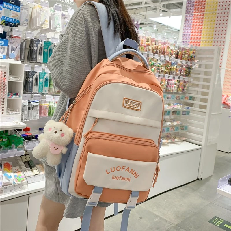 减负护脊书包女初中生中学生少女小学生女生大容量高中生双肩背包