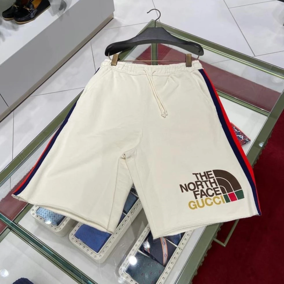 全新未使用 GUCCI/古驰 白色短裤侧边撞色条纹中裤联名款