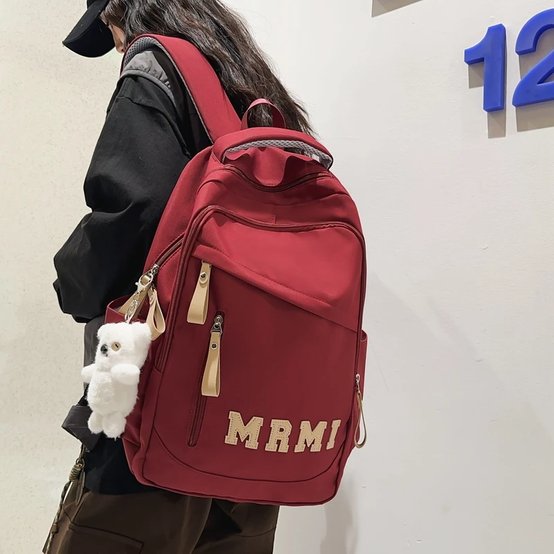 双肩包女2024时尚新款小学初中高中背包大容量ins减负双肩背包