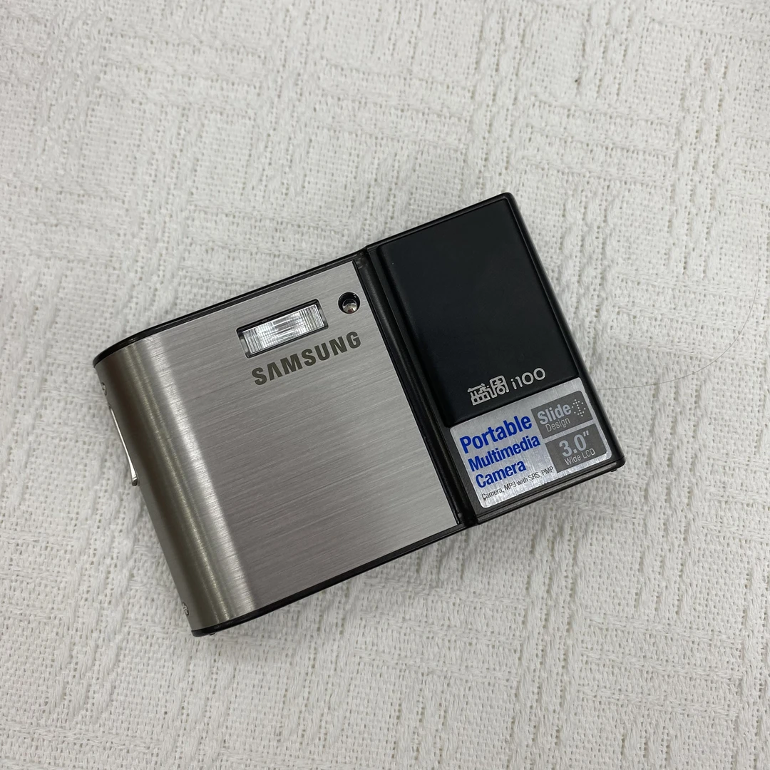 9新 Samsung/三星 i100 银褐色1020W像素 3倍光学变焦 NO退NO换