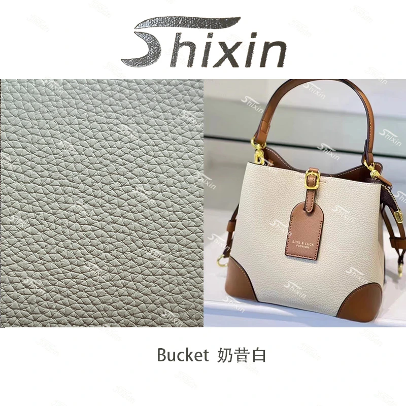 休闲时尚小众简约百搭手提肩包单肩斜挎水桶包